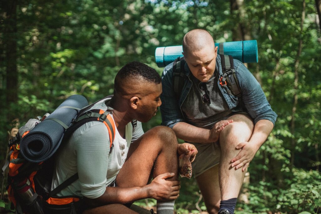 Hikers assessing pain
