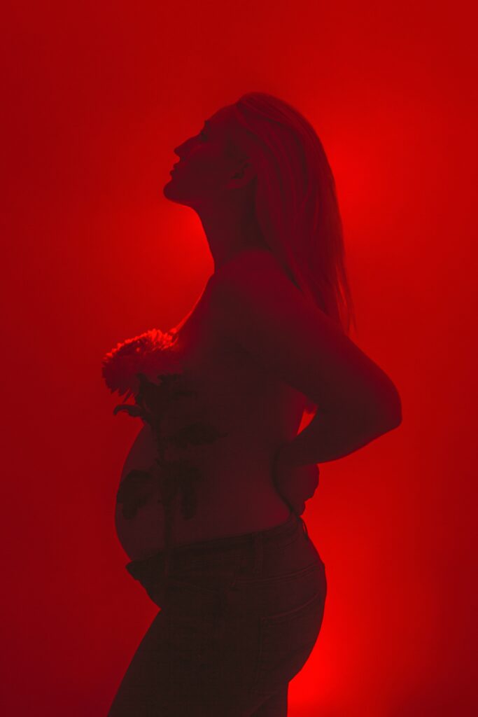 Pregnant woman with back pain. Can Upper Back Pain Be A Sign Of Pregnancy?